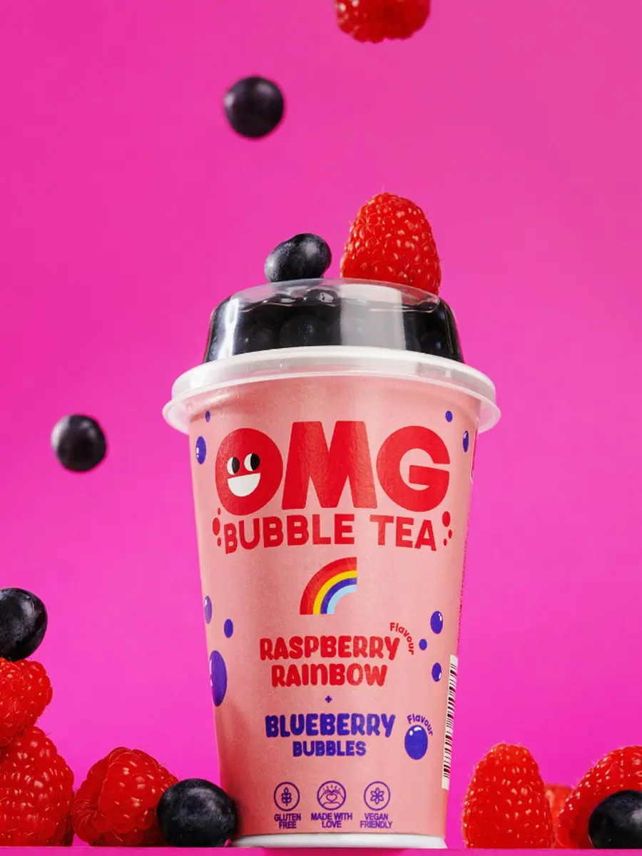 OMG Raspberry Rainbow bubble tea with raspberries and blueberries